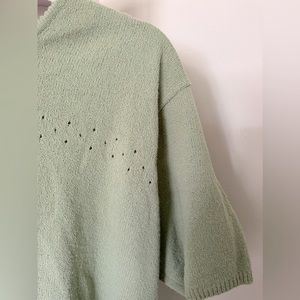 Adorable knitted green shirt giving serious Cottagecore vibes